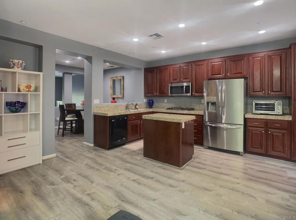 Dining room, Interior, Kitchen, Recessed Lighting, Stainless Steel Appliances, Wood Texture Flooring