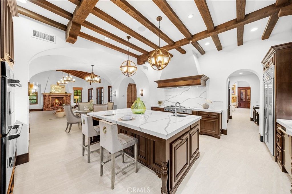 Chandelier, Dining room, Fireplace, Interior, Kitchen, Pendant Lights, Recessed Lighting, Wooden Beams