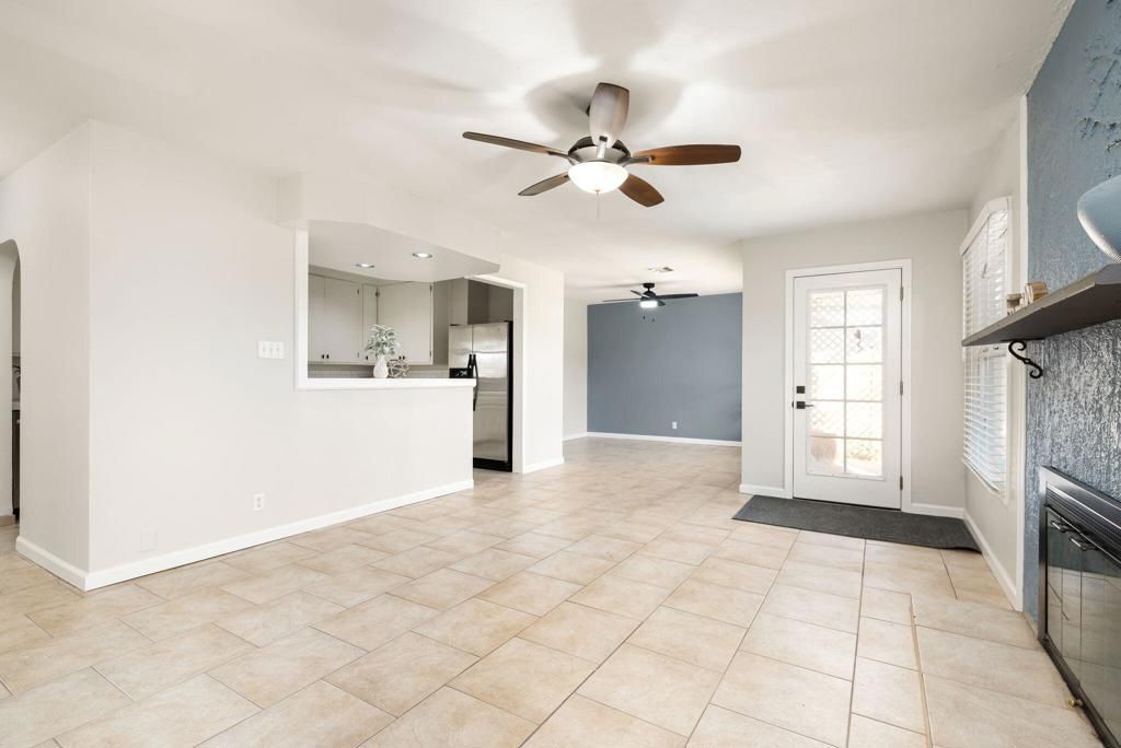 Empty room, Fireplace, Interior, Kitchen, Recessed Lighting, Stainless Steel Appliances