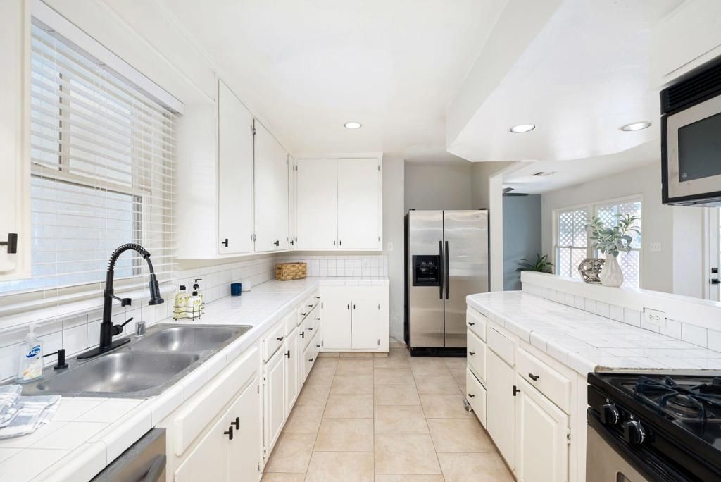 Interior, Kitchen, Recessed Lighting, Tile Countertops