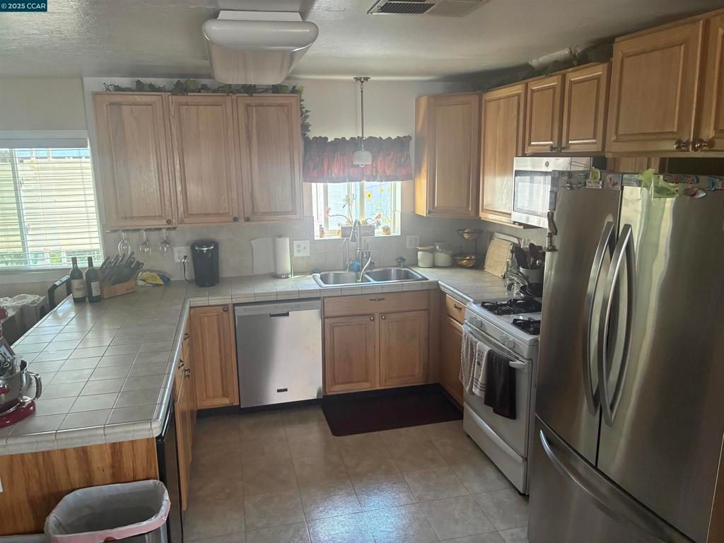 Interior, Kitchen, Stainless Steel Appliances, Tile Countertops