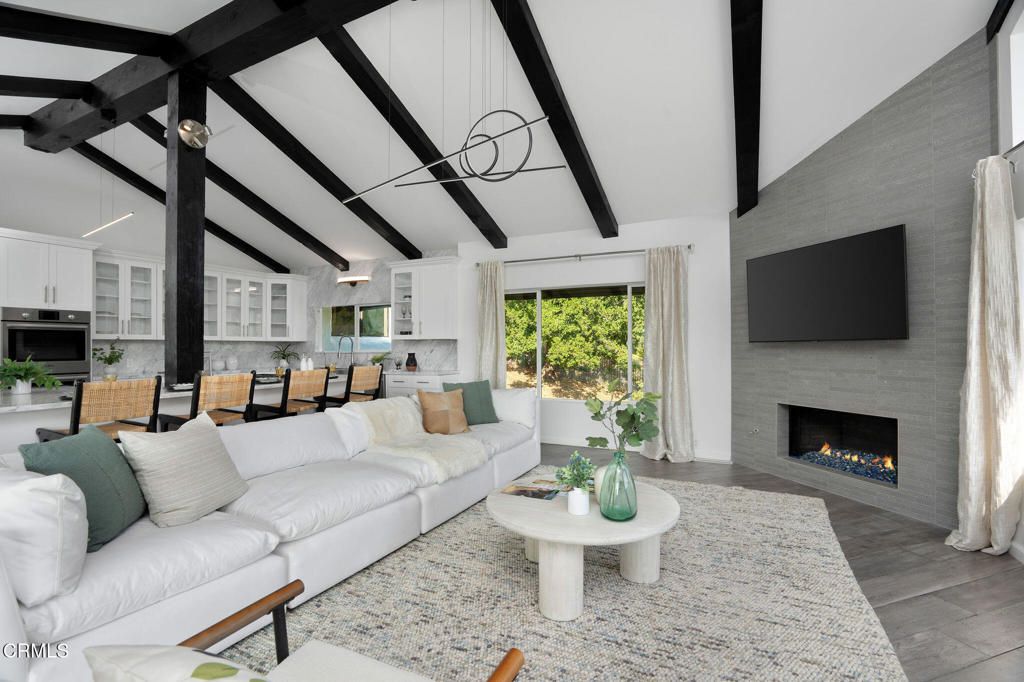 Dining room, Fireplace, Interior, Kitchen, Living room, Pendant Lights, Stainless Steel Appliances, Wooden Beams, Wood Texture Flooring