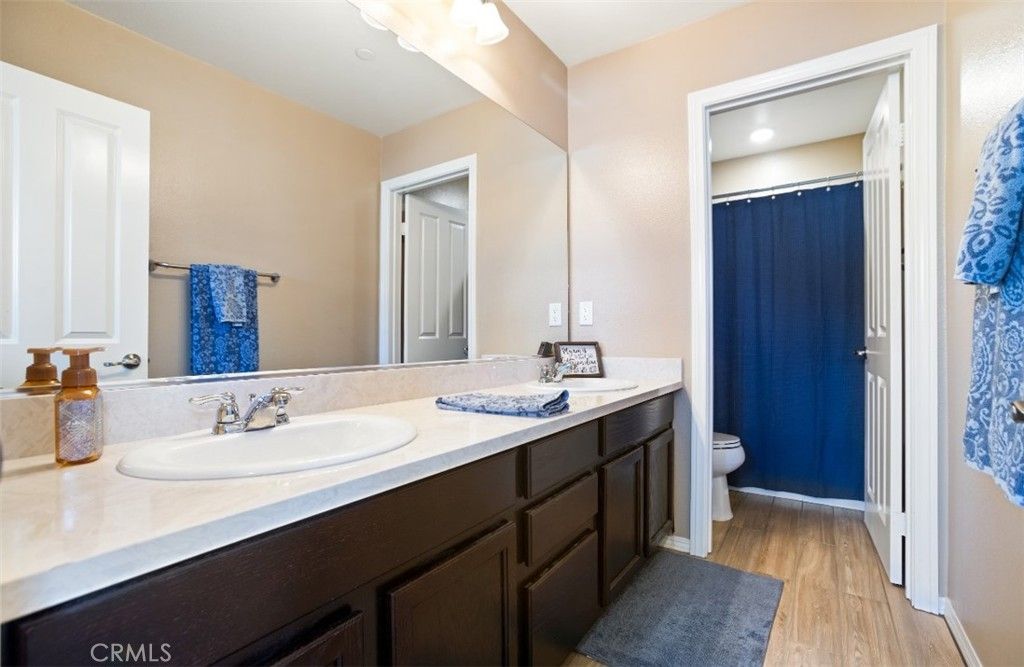 Bathroom, Dual Sink Vanities, Interior, Recessed Lighting, Wood Texture Flooring