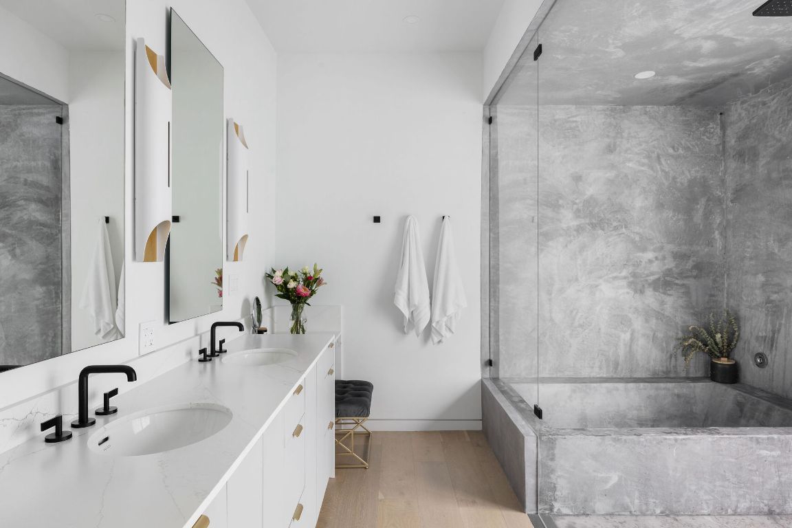 Bathroom, Dual Sink Vanities, Glass Shower, Interior, Marble Walls, Wood Texture Flooring