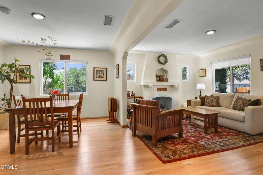 Dining room, Fireplace, Interior, Living room, Recessed Lighting, Wood Texture Flooring