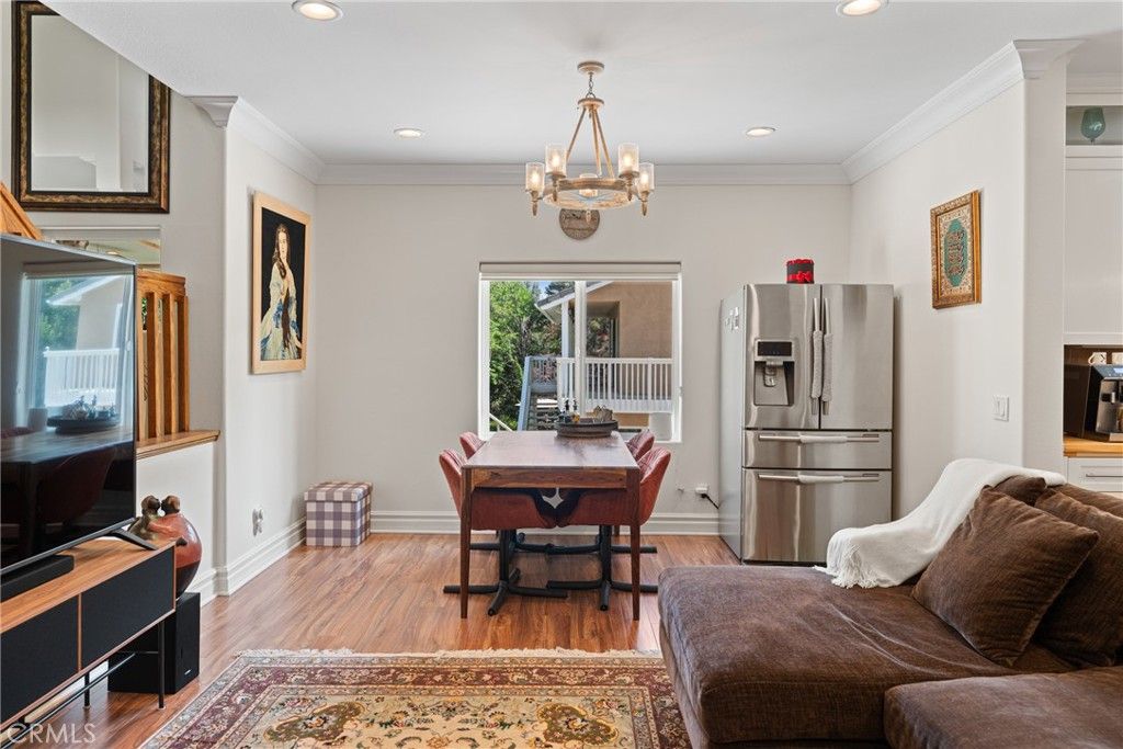 Chandelier, Dining room, Interior, Kitchen, Recessed Lighting, Stainless Steel Appliances, Wood Texture Flooring