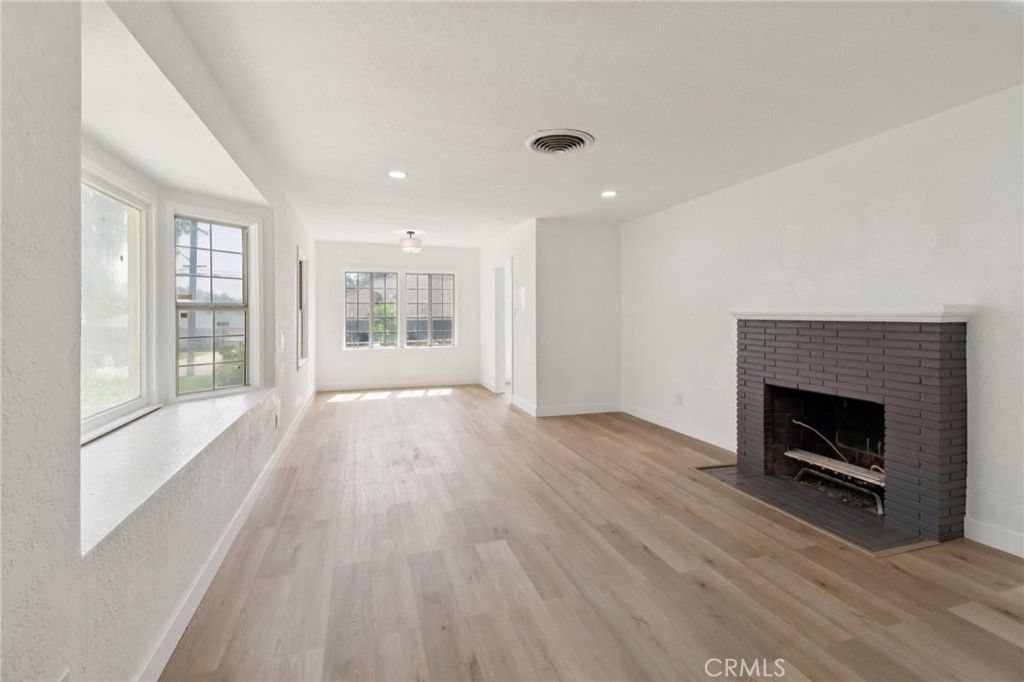 Empty room, Fireplace, Interior, Recessed Lighting, Wood Texture Flooring