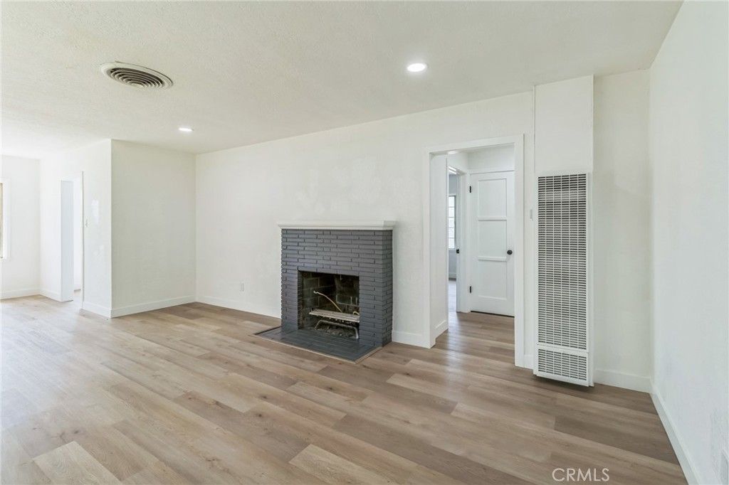 Empty room, Fireplace, Interior, Recessed Lighting, Wood Texture Flooring