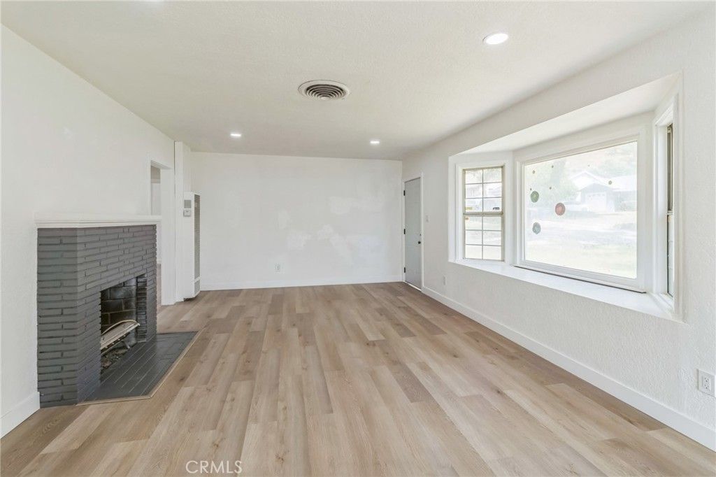 Empty room, Fireplace, Interior, Recessed Lighting, Wood Texture Flooring