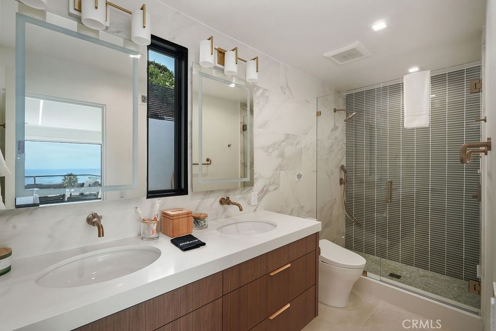 Bathroom, Dual Sink Vanities, Glass Shower, Interior, Marble Walls, Recessed Lighting, Water