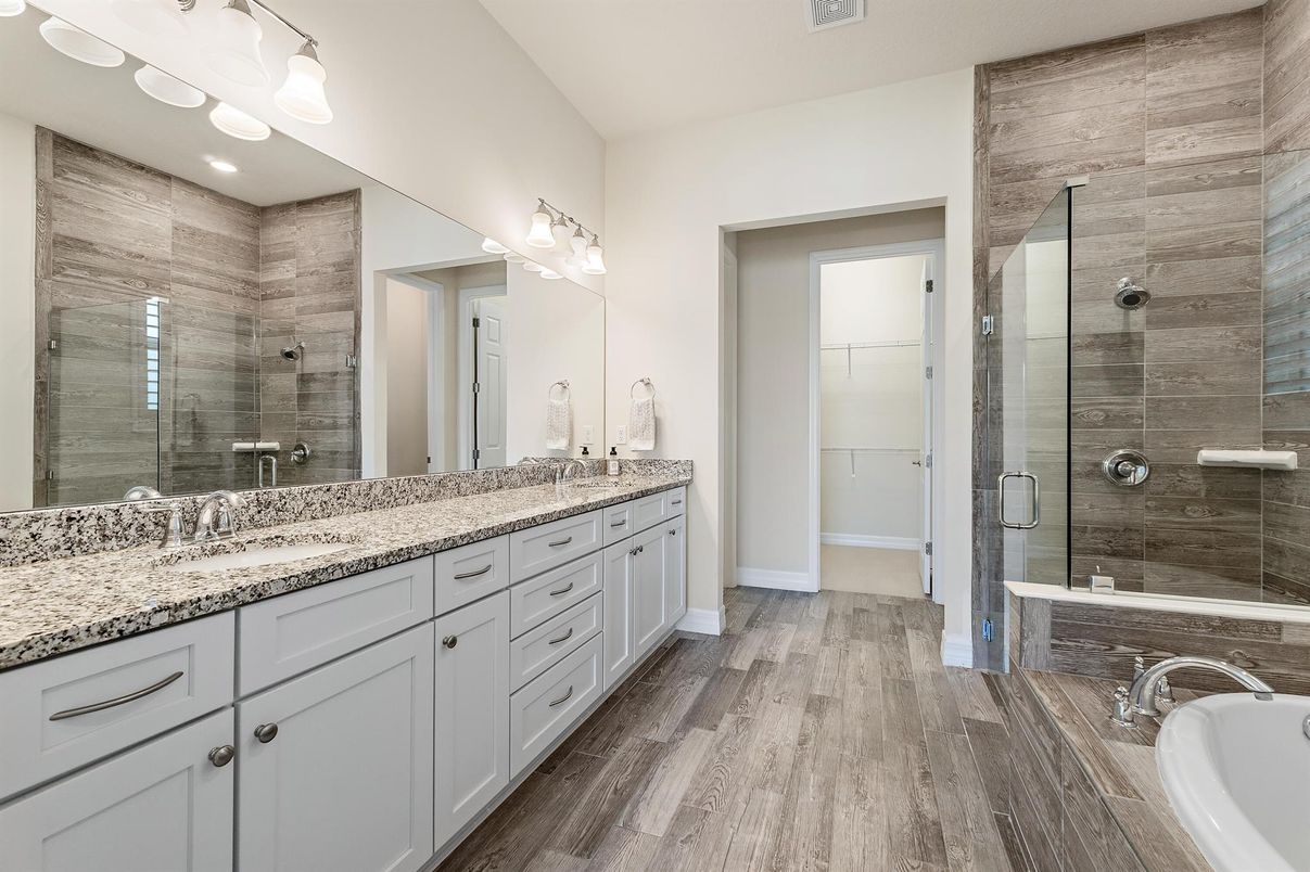 Bathroom, Dual Sink Vanities, Glass Shower, Interior, Recessed Lighting, Wood Texture Flooring
