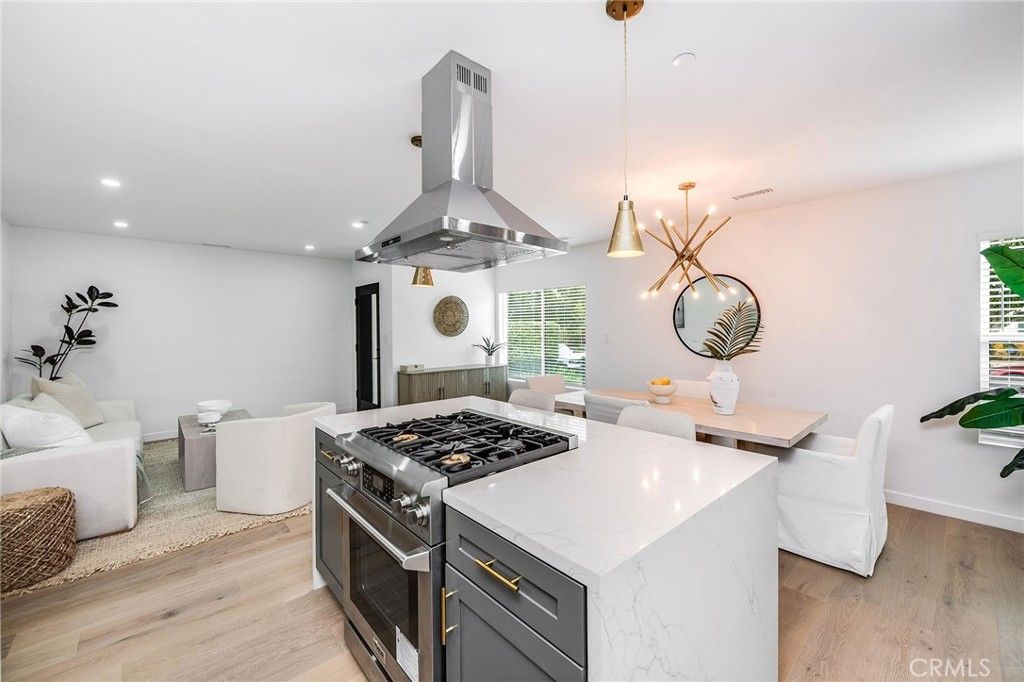 Dining room, Interior, Kitchen, Living room, Pendant Lights, Recessed Lighting, Stainless Steel Appliances, Wood Texture Flooring