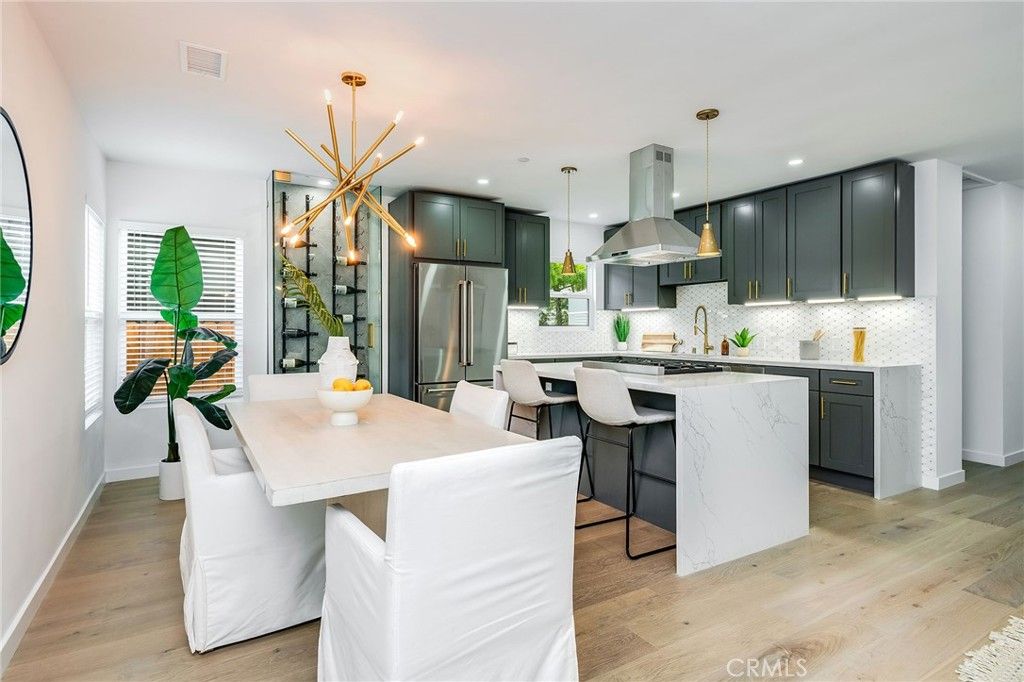 Dining room, Interior, Kitchen, Pendant Lights, Recessed Lighting, Stainless Steel Appliances, Wood Texture Flooring