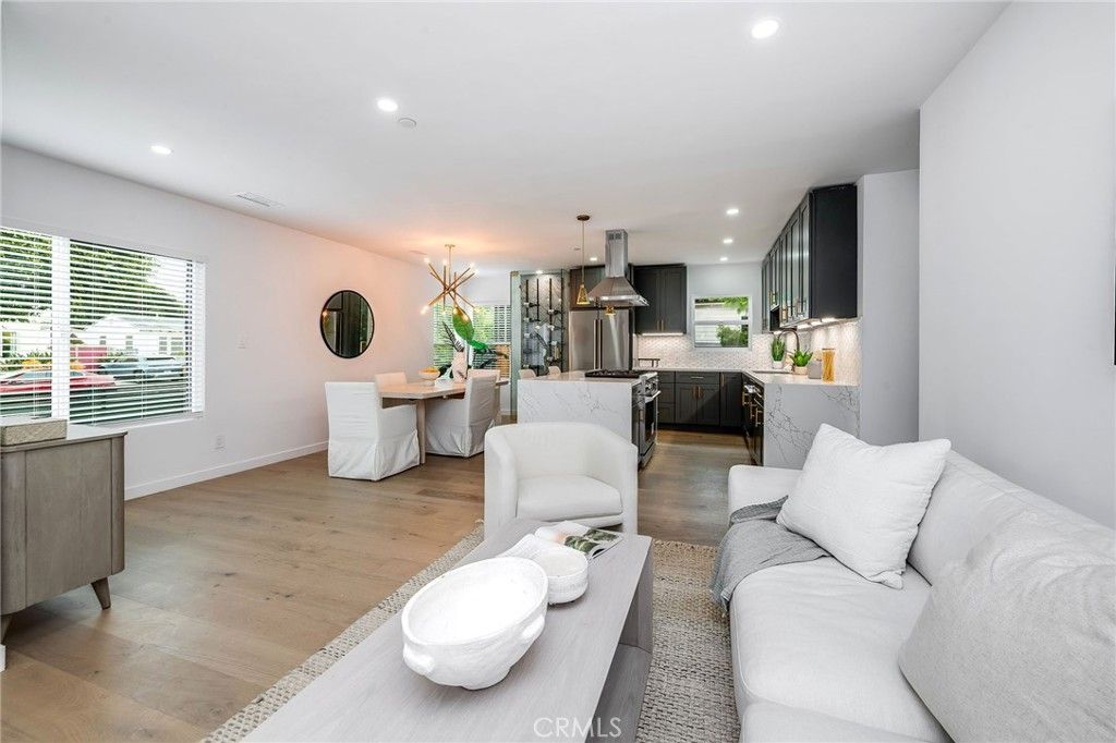 Dining room, Interior, Kitchen, Living room, Pendant Lights, Recessed Lighting, Stainless Steel Appliances, Wood Texture Flooring