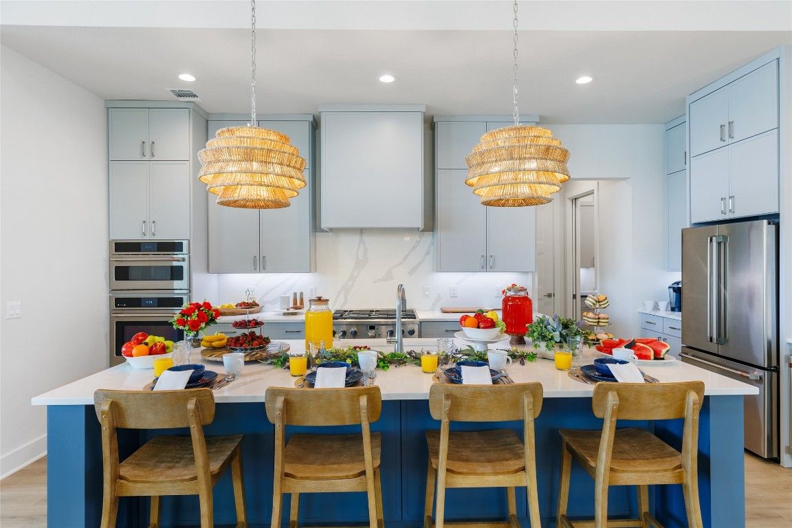 Chandelier, Interior, Kitchen, Pendant Lights, Recessed Lighting, Stainless Steel Appliances, Wood Texture Flooring