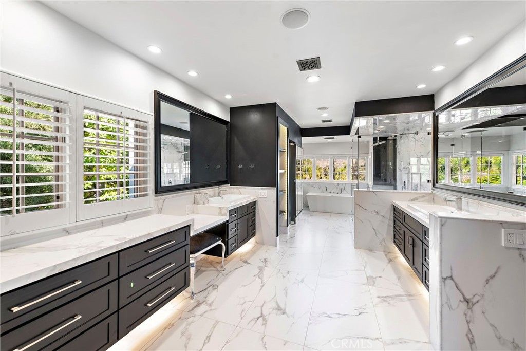 Bathroom, Dual Sink Vanities, Glass Shower, Interior, Marble, Marble Walls, Recessed Lighting