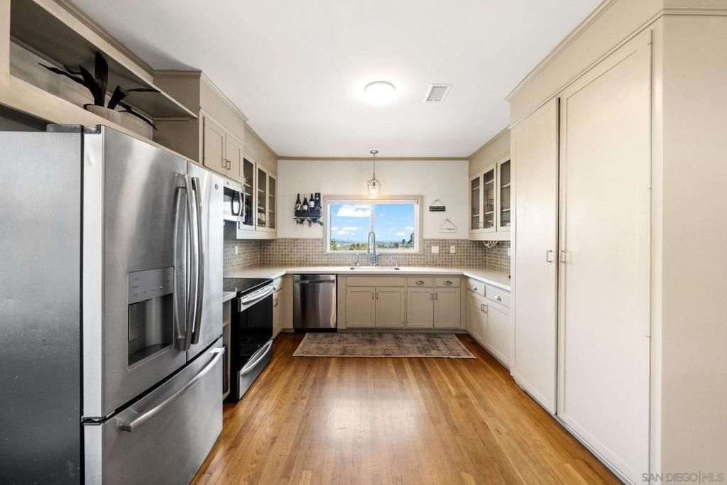 Interior, Kitchen, Pendant Lights, Stainless Steel Appliances, Wood Texture Flooring