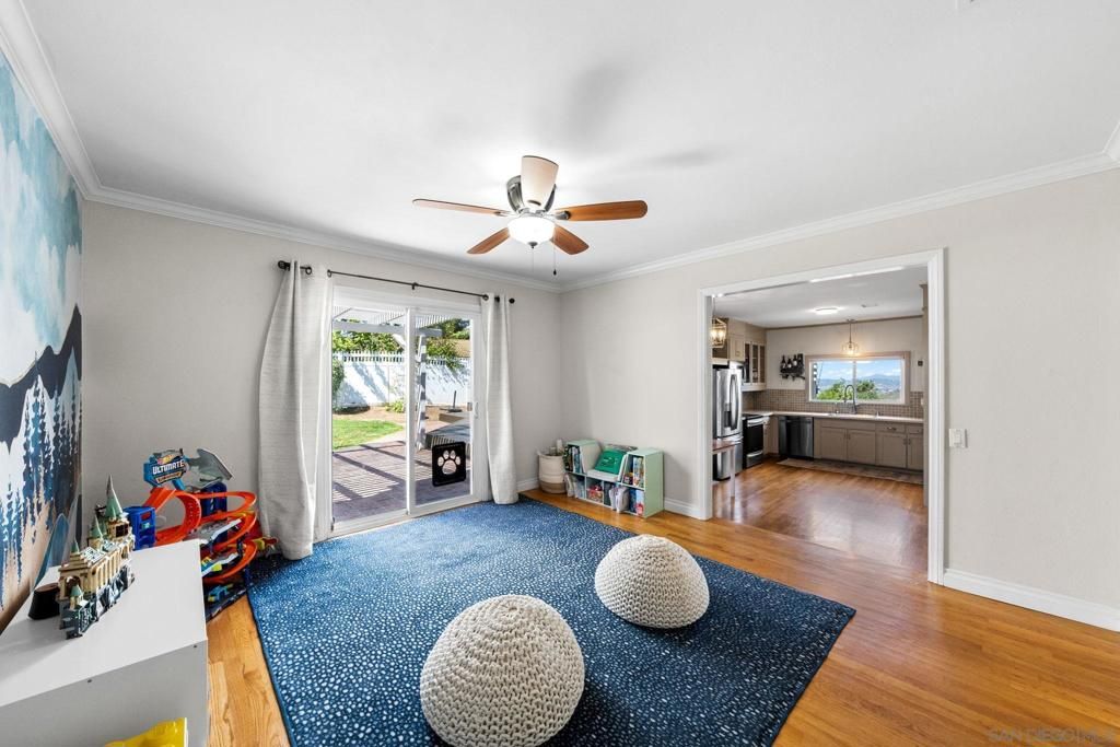 Empty room, Interior, Kitchen, Recessed Lighting, Stainless Steel Appliances, Wood Texture Flooring