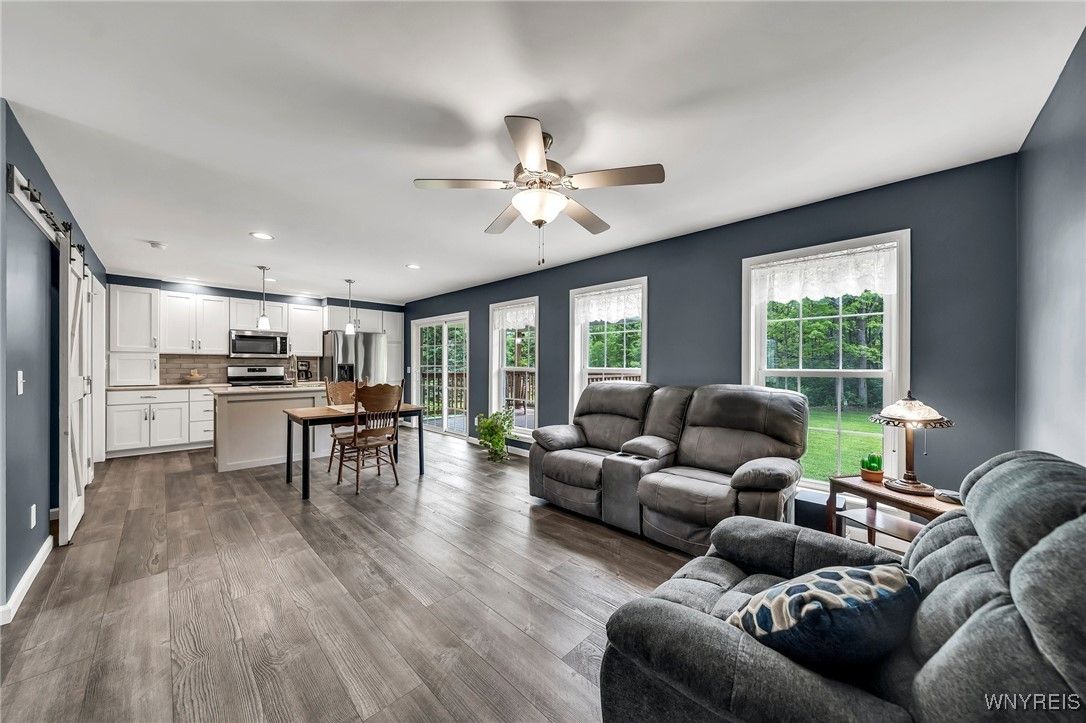 Dining room, Interior, Kitchen, Living room, Pendant Lights, Recessed Lighting, Stainless Steel Appliances, Wood Texture Flooring