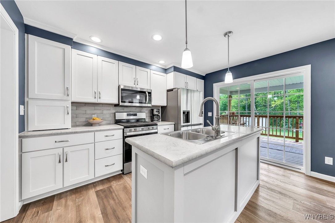 Interior, Kitchen, Pendant Lights, Recessed Lighting, Stainless Steel Appliances, Wood Texture Flooring