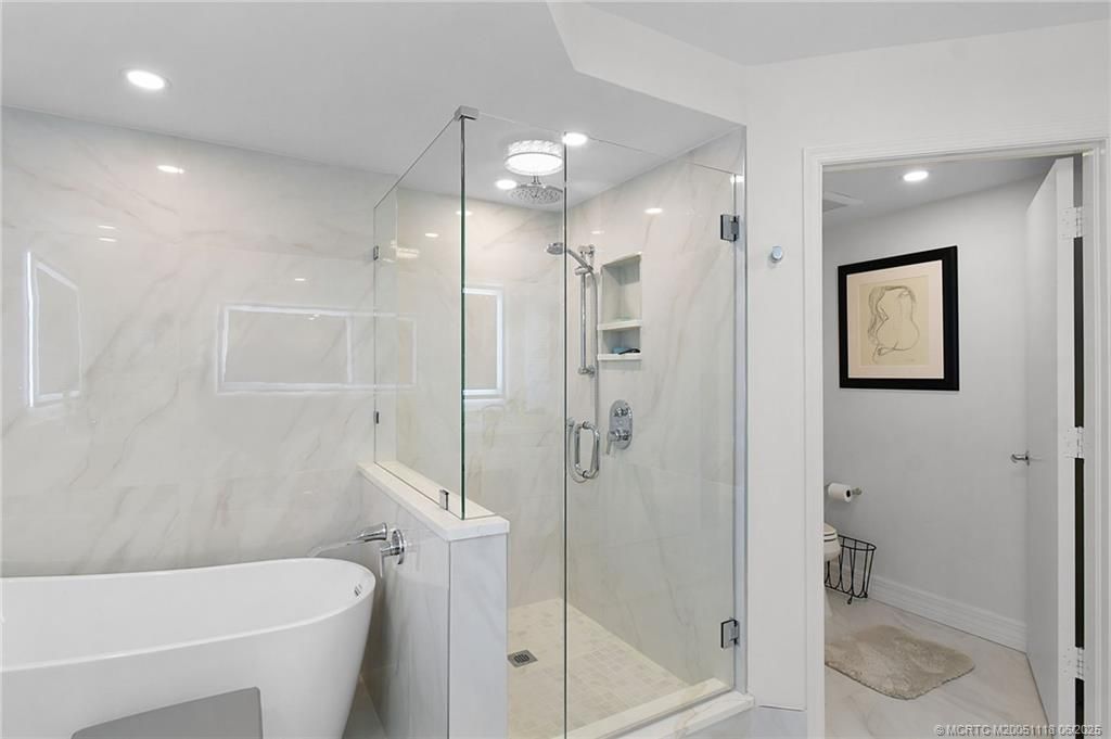 Bathroom, Free Standing Baths, Glass Shower, Interior, Marble Walls, Recessed Lighting