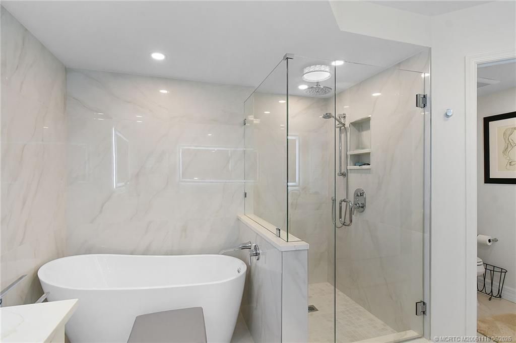 Bathroom, Free Standing Baths, Glass Shower, Interior, Marble Walls, Recessed Lighting