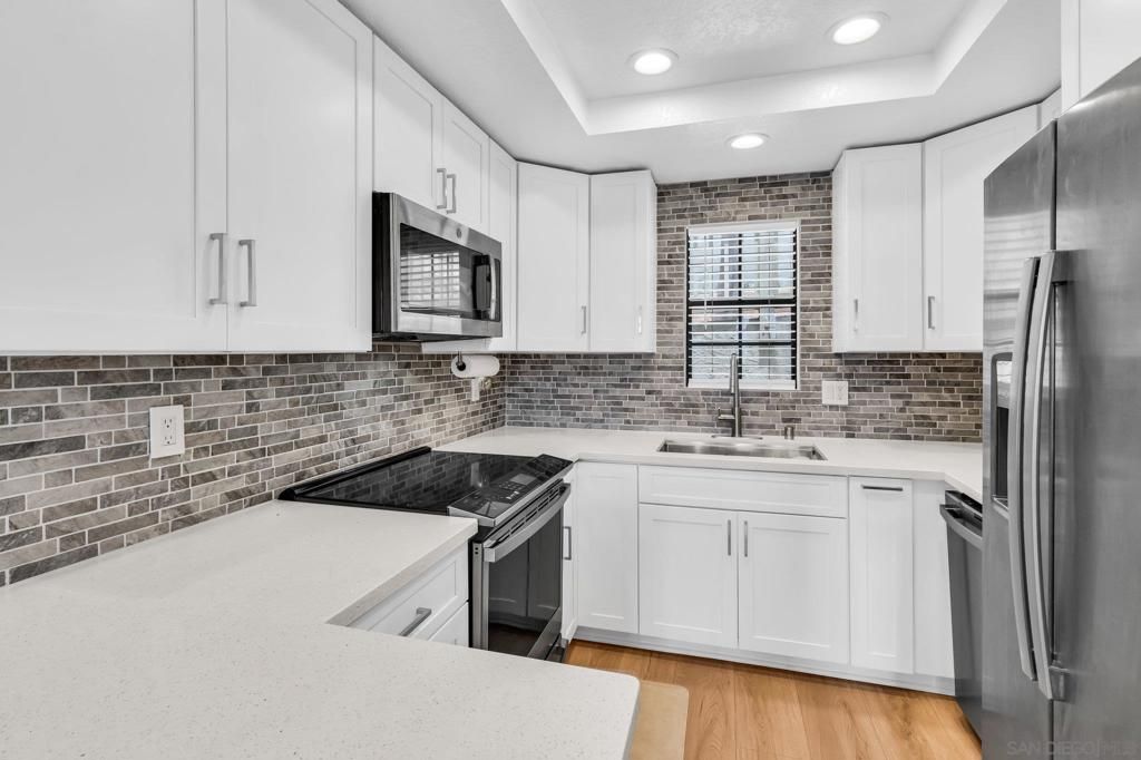 Interior, Kitchen, Recessed Lighting, Stainless Steel Appliances, Stone Walls, Wood Texture Flooring