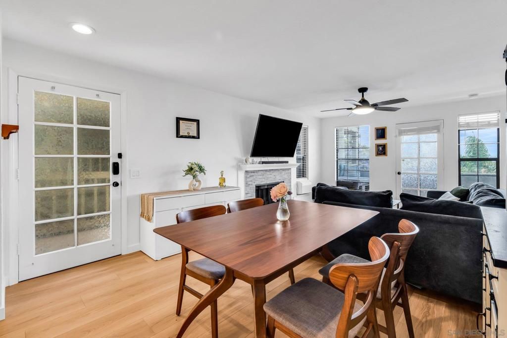 Dining room, Fireplace, Interior, Living room, Recessed Lighting, Wood Texture Flooring