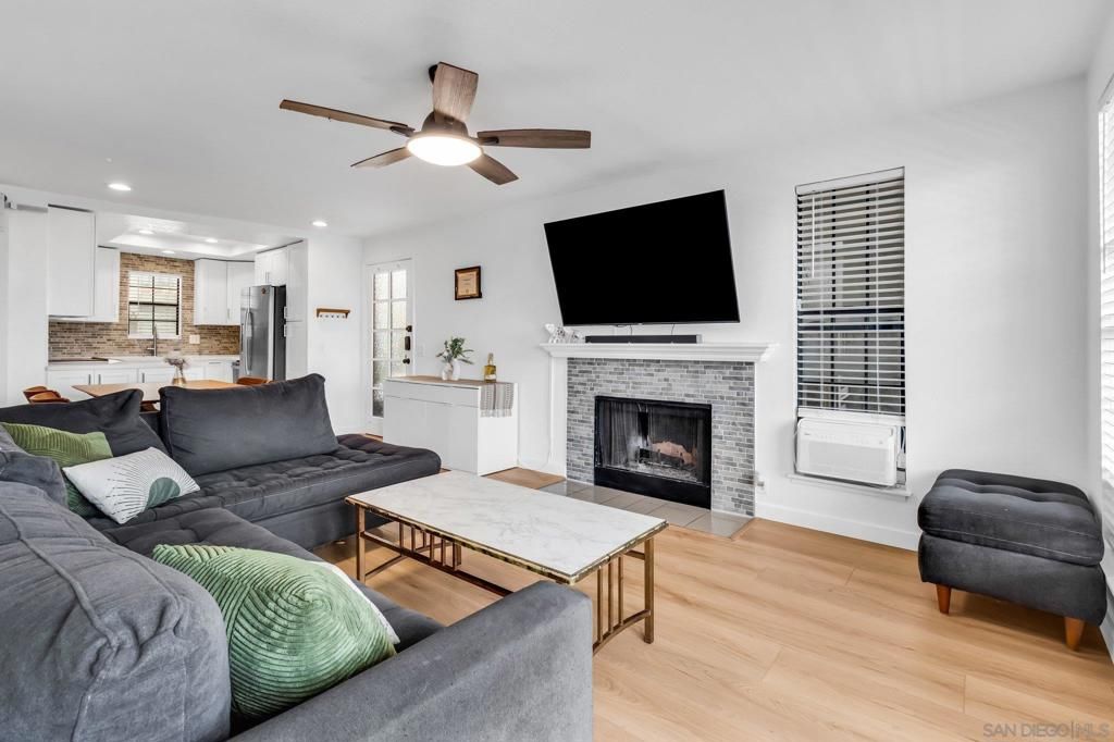 Fireplace, Interior, Kitchen, Living room, Recessed Lighting, Wood Texture Flooring
