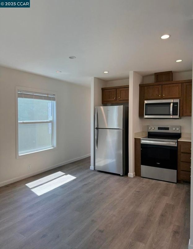 Interior, Kitchen, Recessed Lighting, Stainless Steel Appliances, Wood Texture Flooring