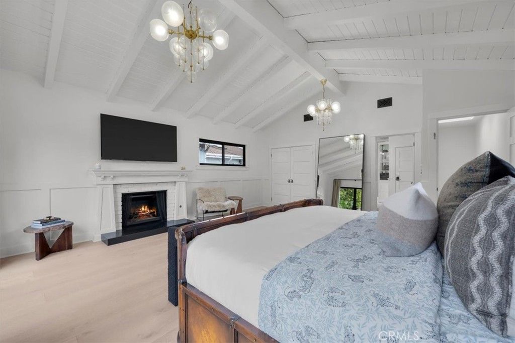 Bedroom, Chandelier, Fireplace, Interior, Wood Texture Flooring