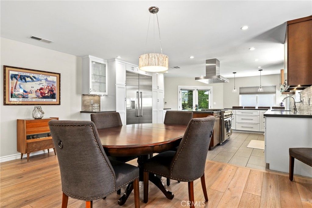 Dining room, Interior, Kitchen, Pendant Lights, Recessed Lighting, Stainless Steel Appliances, Wood Texture Flooring