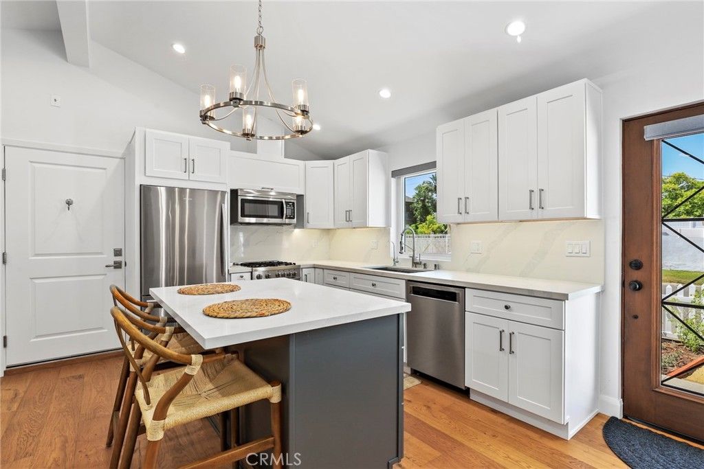 Chandelier, Interior, Kitchen, Recessed Lighting, Stainless Steel Appliances, Wood Texture Flooring