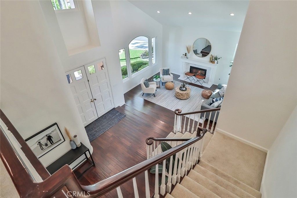 Dining room, Fireplace, Interior, Living room, Recessed Lighting, Wood Texture Flooring