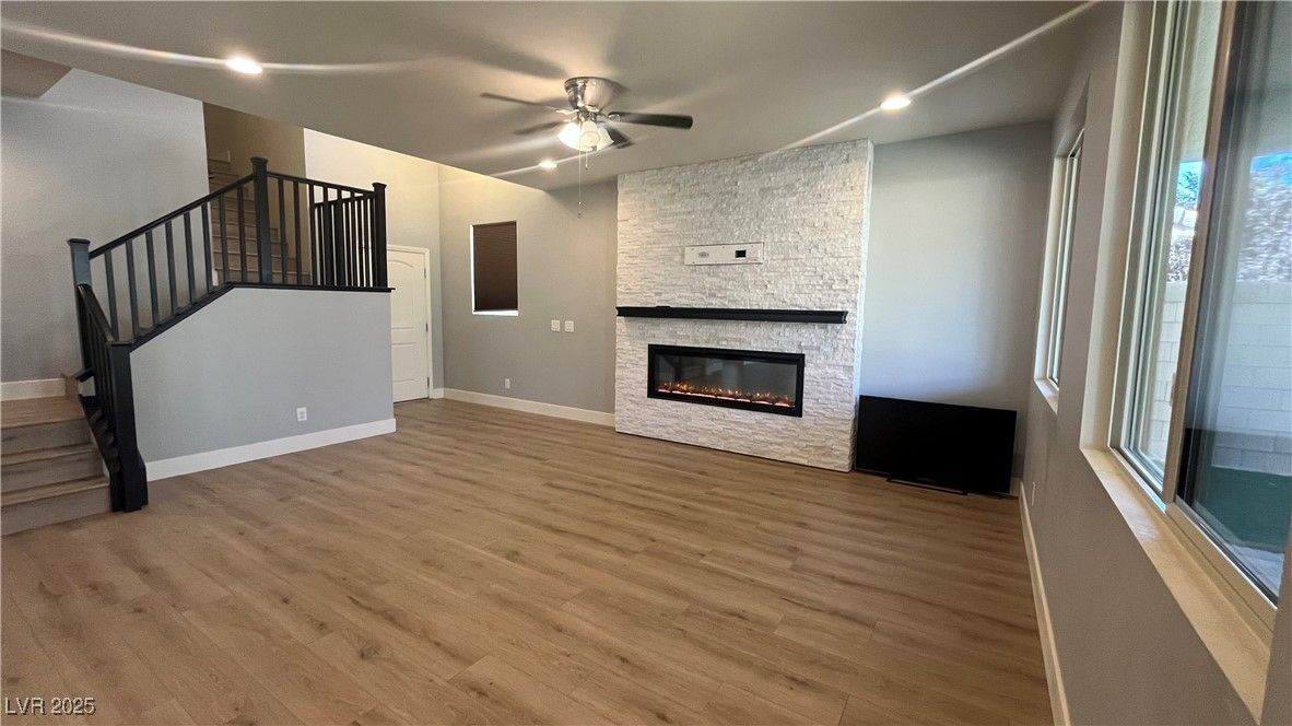 Fireplace, Interior, Recessed Lighting, Stone Walls, Wood Texture Flooring