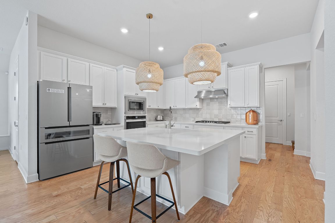 Interior, Kitchen, Pendant Lights, Recessed Lighting, Stainless Steel Appliances, Wood Texture Flooring