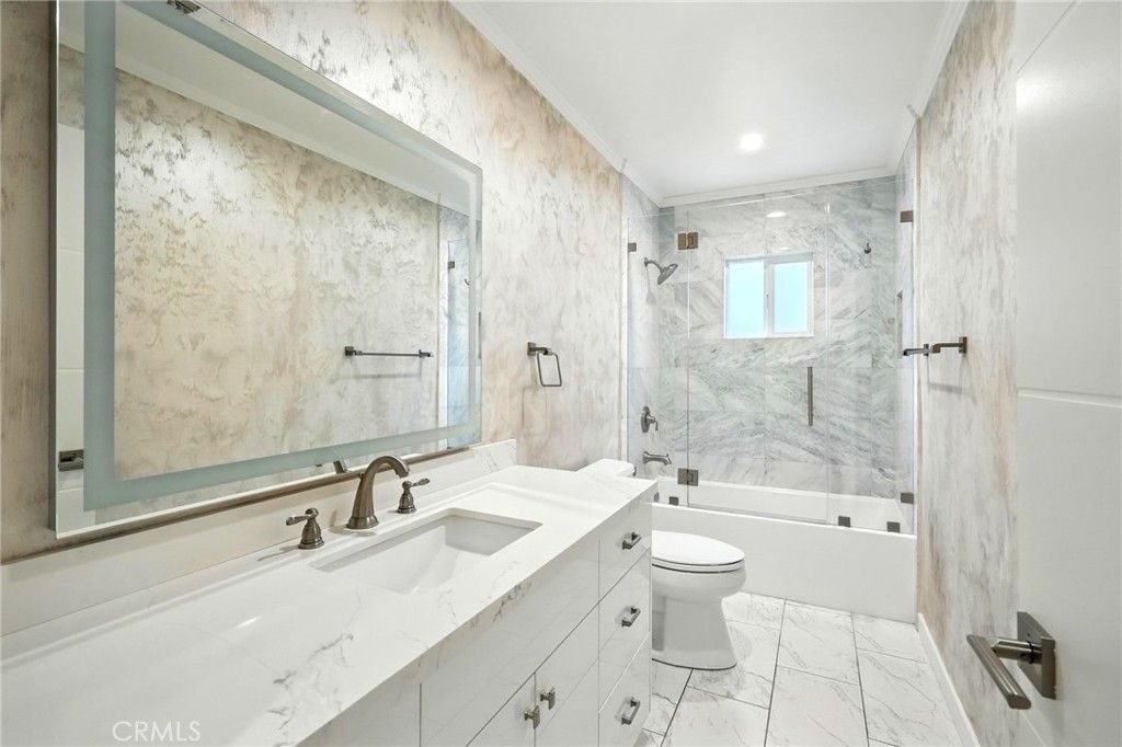 Bathroom, Dual Sink Vanities, Interior, Marble, Marble Walls, Recessed Lighting