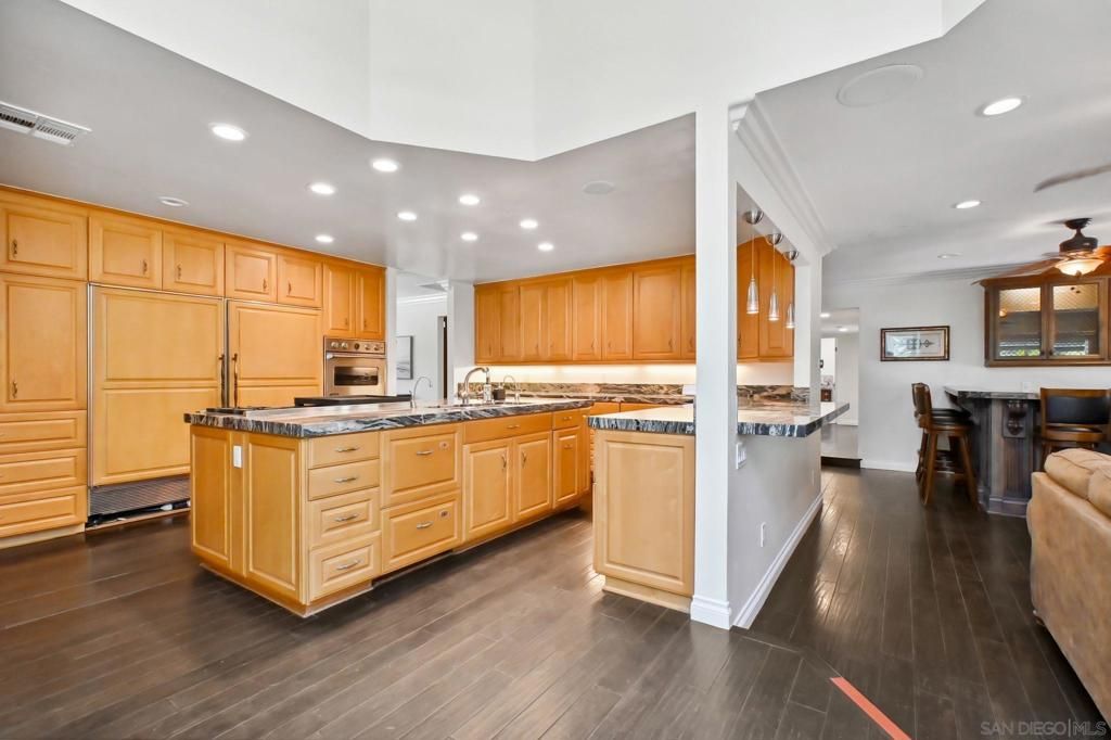 Interior, Kitchen, Recessed Lighting, Tile Countertops, Wood Texture Flooring