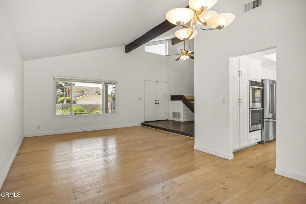 Empty room, Interior, Kitchen, Stainless Steel Appliances, Wooden Beams, Wood Texture Flooring