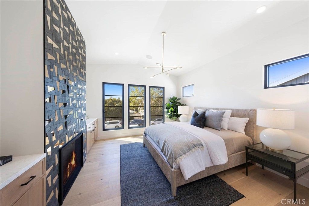 Bedroom, Fireplace, Interior, Pendant Lights, Recessed Lighting, Wood Texture Flooring