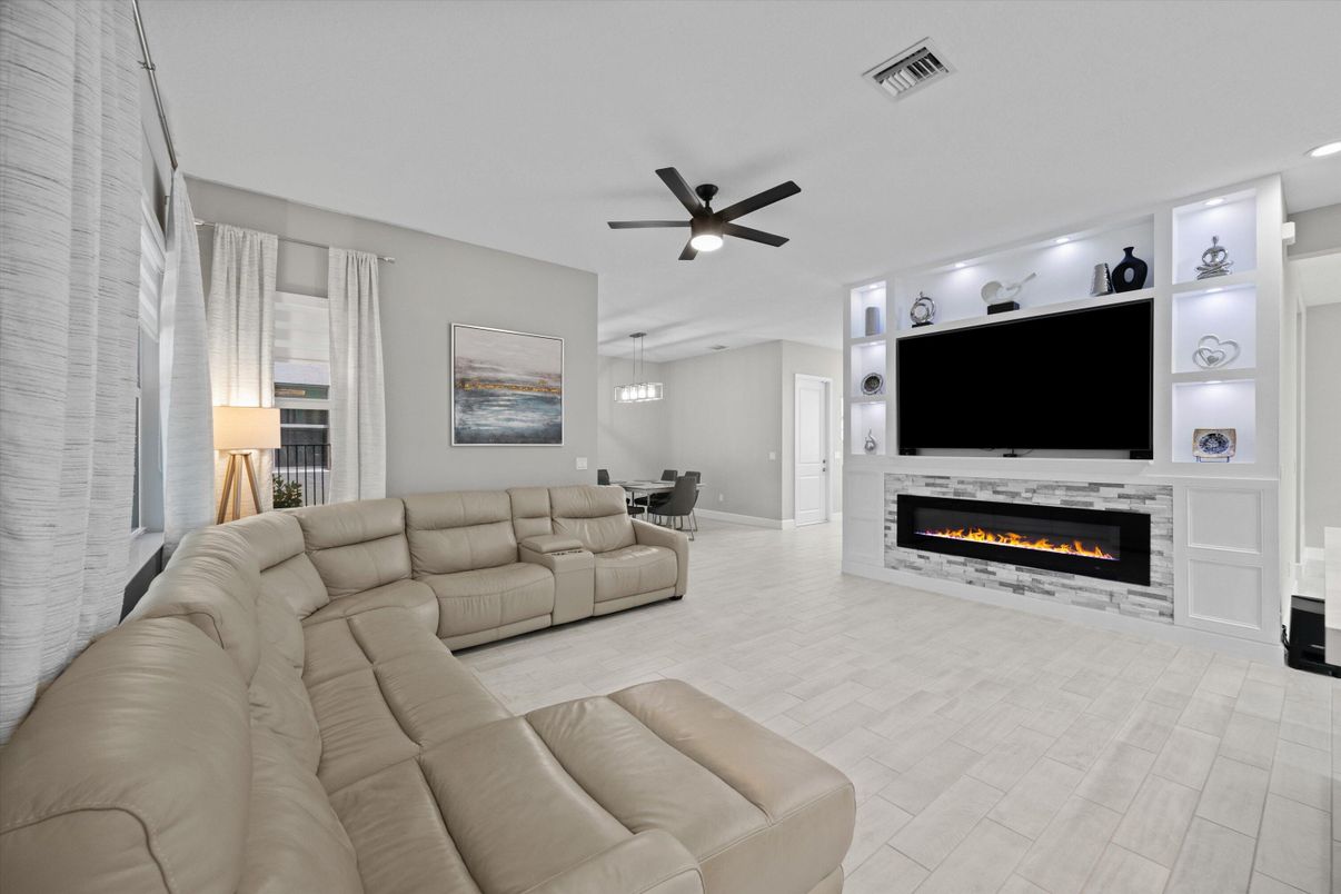 Dining room, Fireplace, Interior, Living room, Recessed Lighting, Wood Texture Flooring