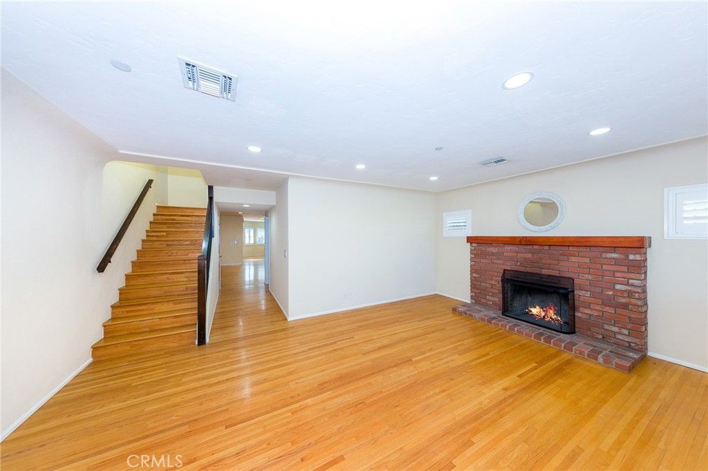 Empty room, Fireplace, Interior, Recessed Lighting, Wood Texture Flooring
