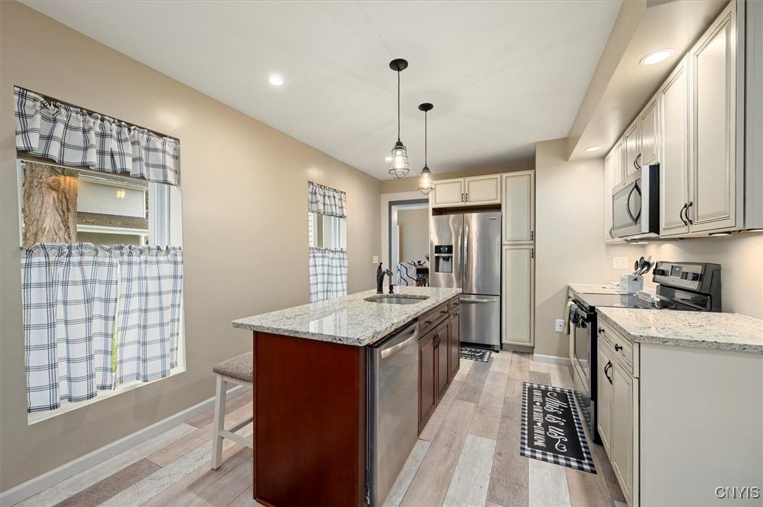 Interior, Kitchen, Pendant Lights, Recessed Lighting, Stainless Steel Appliances, Wood Texture Flooring
