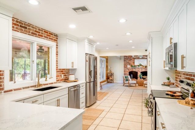 Fireplace, Interior, Kitchen, Recessed Lighting, Stainless Steel Appliances, Stone Walls