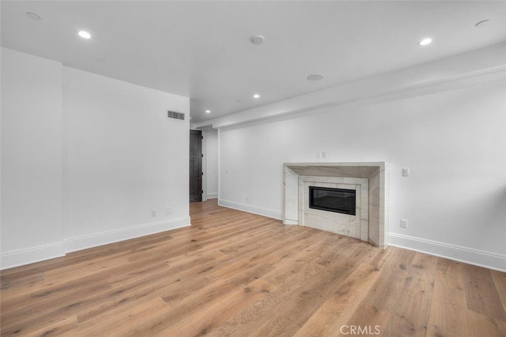 Empty room, Fireplace, Interior, Recessed Lighting, Wood Texture Flooring