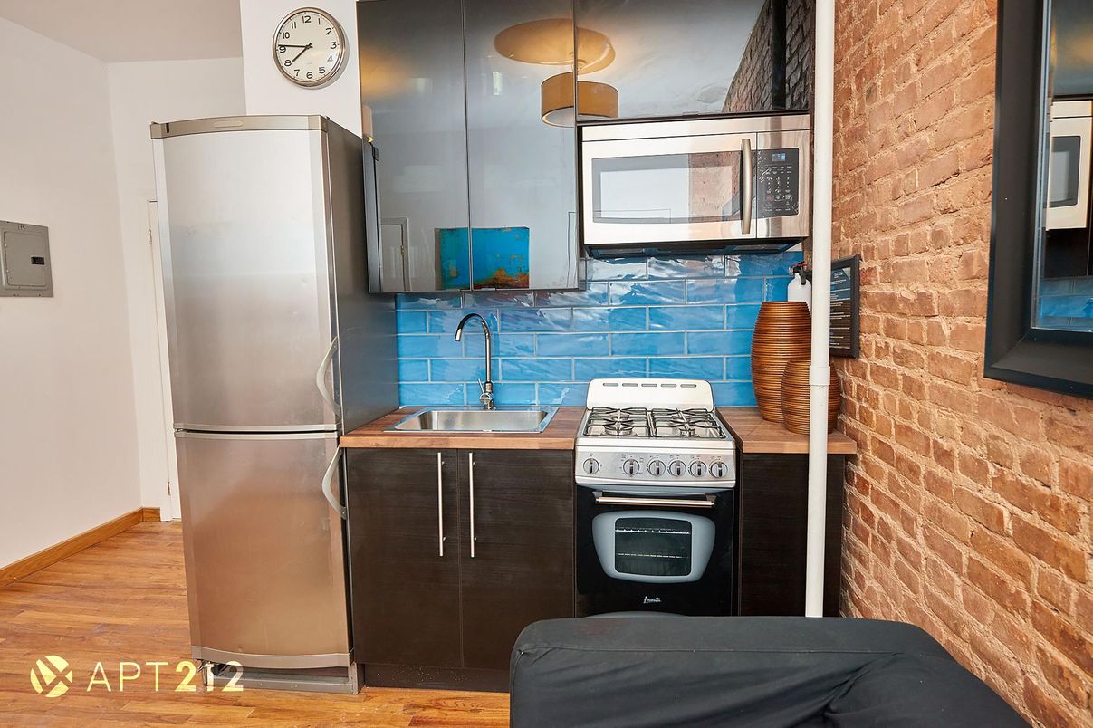Interior, Kitchen, Stainless Steel Appliances, Stone Walls, Wood Texture Flooring