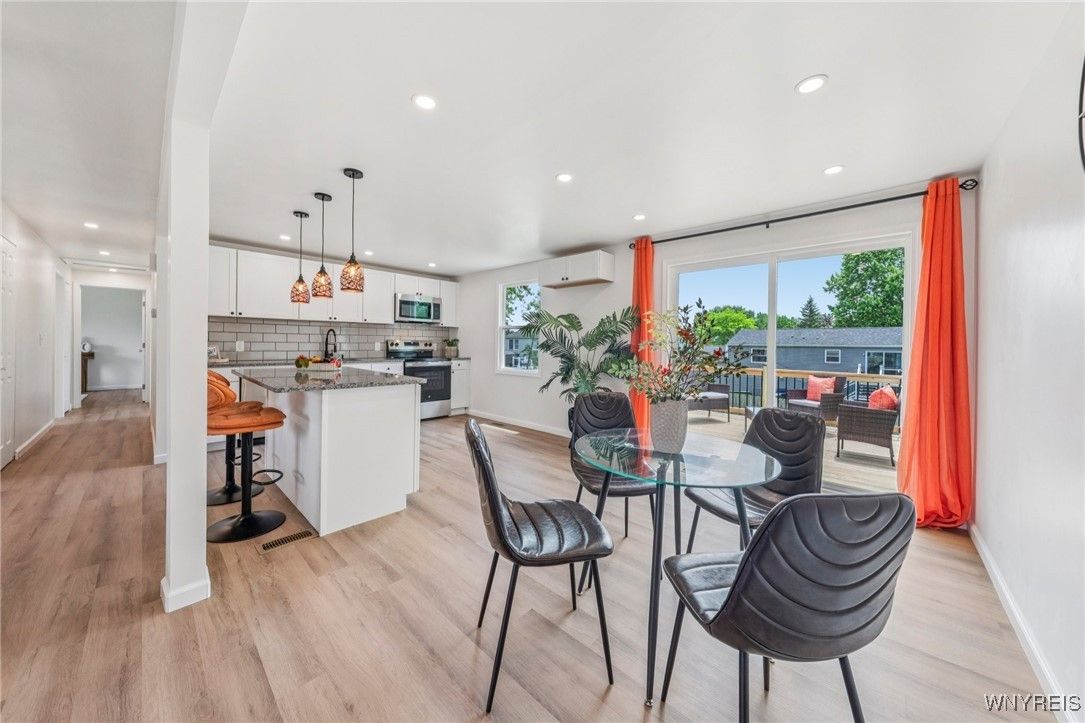 Dining room, Interior, Kitchen, Pendant Lights, Recessed Lighting, Stainless Steel Appliances, Wood Texture Flooring