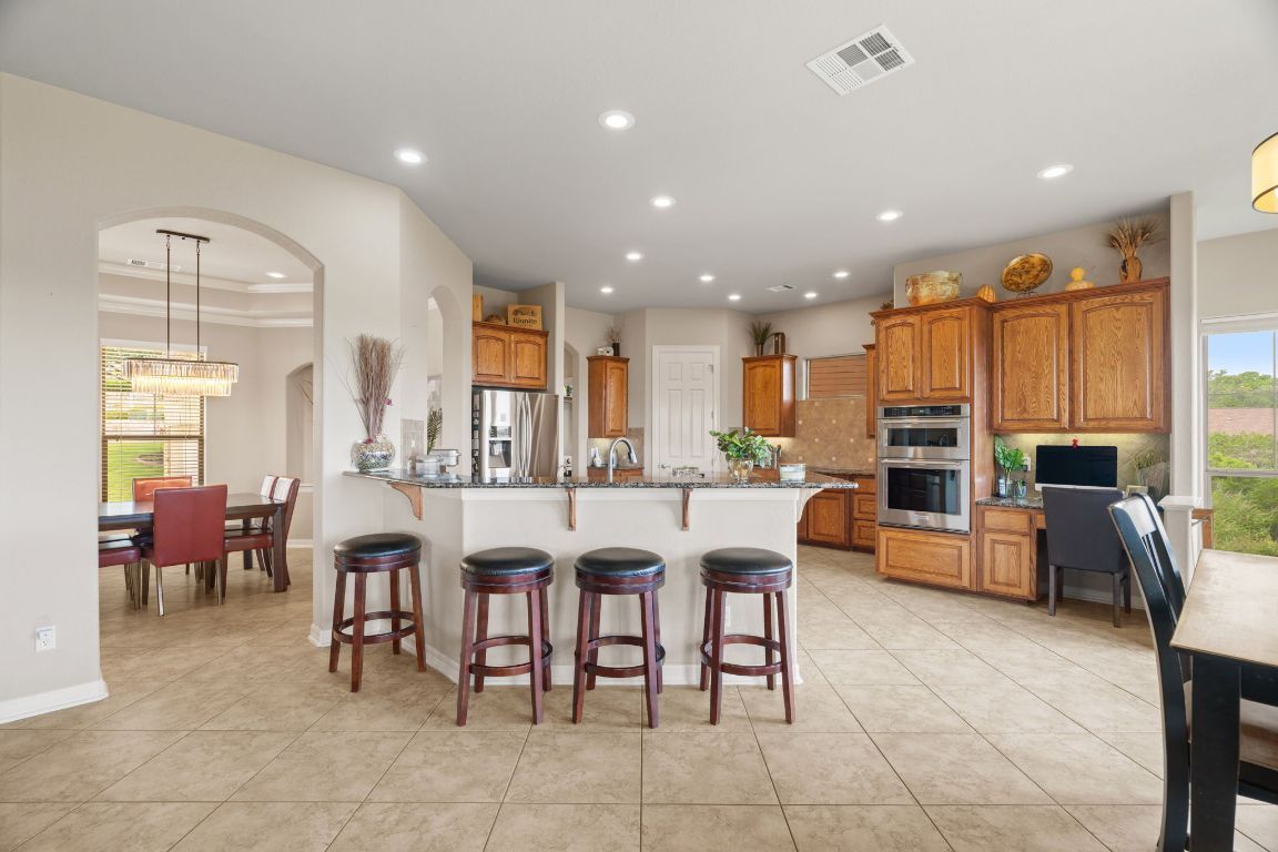 Chandelier, Dining room, Interior, Kitchen, Recessed Lighting, Stainless Steel Appliances