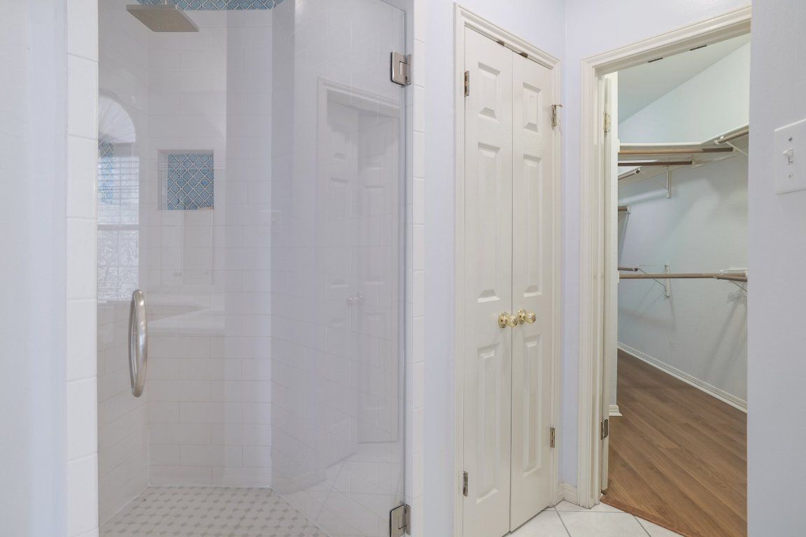 Bathroom, Glass Shower, Interior, Walk-in Closets, Wood Texture Flooring
