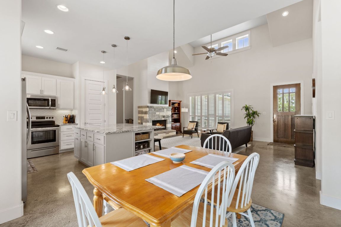 Dining room, Fireplace, Interior, Kitchen, Living room, Pendant Lights, Recessed Lighting, Stainless Steel Appliances